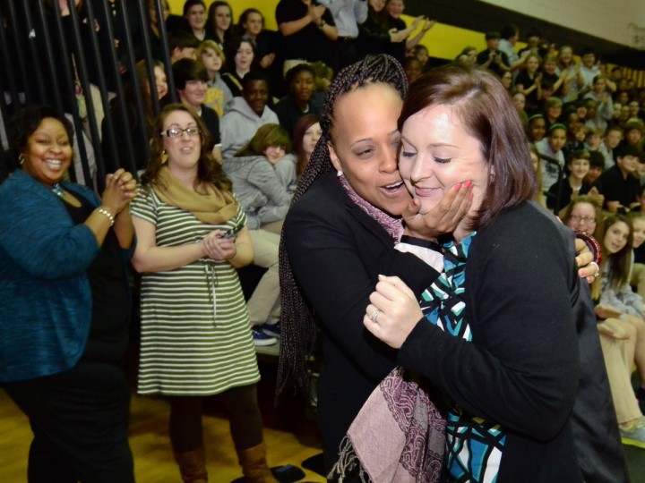 Jennifer Olewnik hugged by colleague