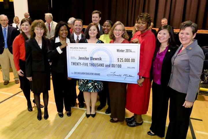 Jennifer Olewnik with check and Milken Educators