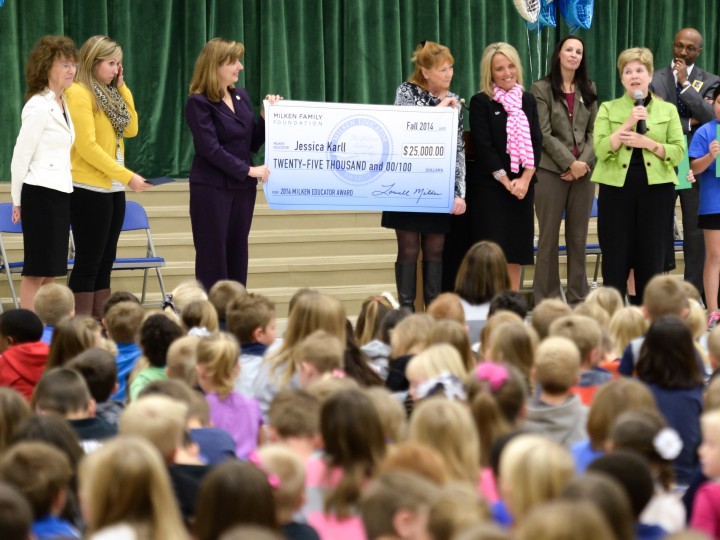 Jessica Karll and VIPs in front of assembly