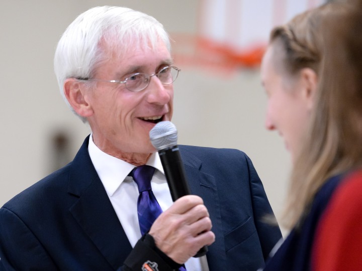 Josie Igielski congratulated by Dr Tony Evers