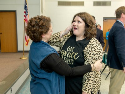 Kara Davis hug from principal