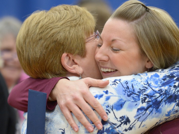 Katie Sedore receives a hug