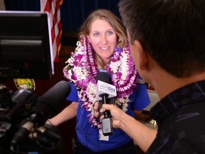 Kelly Sutcliffe talks with reporters