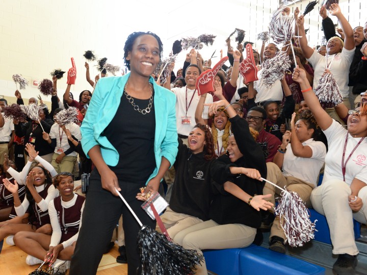 Kena Allison smiles students cheer wildly