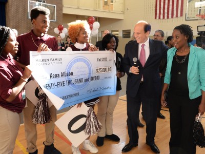 Kena Allison with Mike Milken and 25000 check