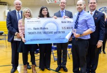 Kevin Winters group with check
