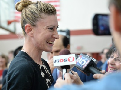 Lauren Jensen talks to reporters