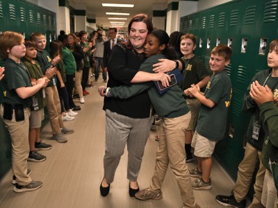 Lauren Waguespack Student Hug