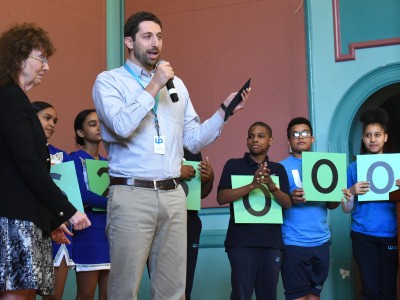 Lawrence 2017 Dan Adler addresses assembly UP Academy Leonard