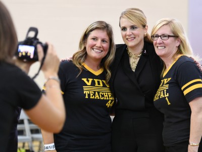 Lindsay Frevert poses with dignitaries