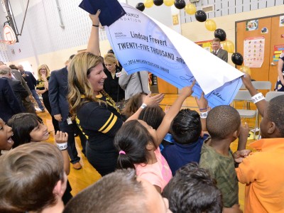 Lindsay Frevert shows students check