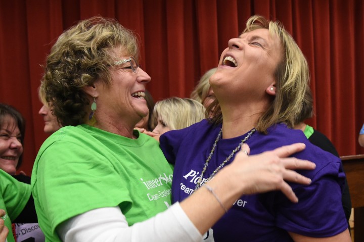 Lisa Richard exuberant with colleague