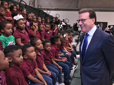 Lowell Milken Greets Students