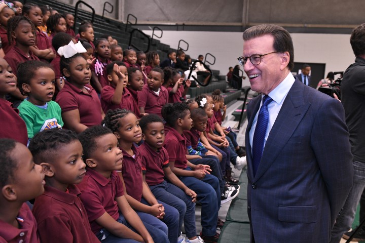 Lowell Milken Greets Students