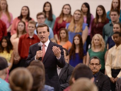 Lowell Milken addresses Red Mountain HS assembly