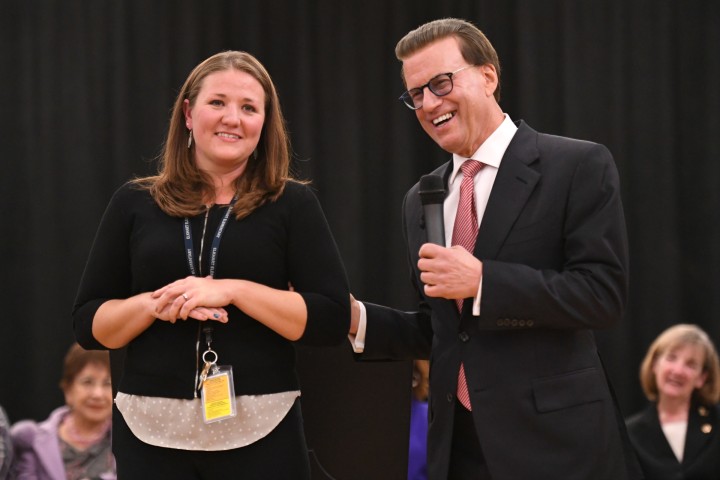 Lowell Milken congratulates Jennie Schmaltz