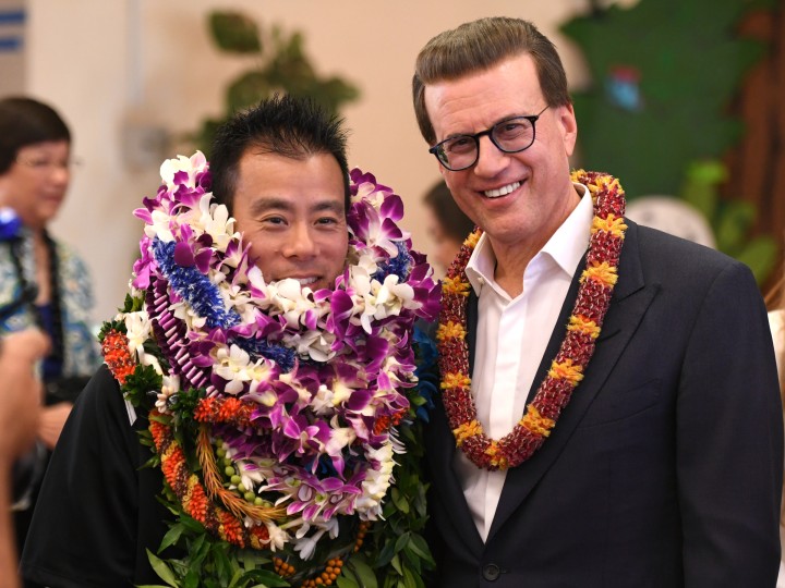 Lowell Milken congratulates Masaru Uchino