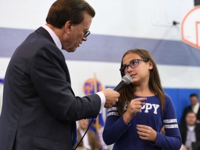 Lowell Milken questions Brougham student
