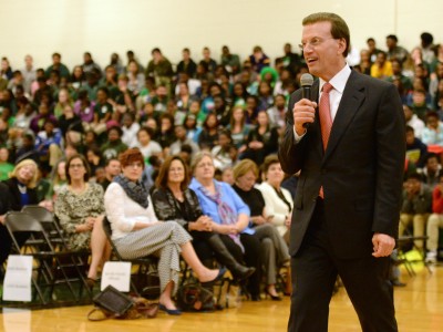 Lowell Milken talks to crowd