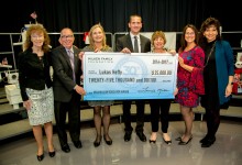 Lukas Hefty check with Milken Educator vets