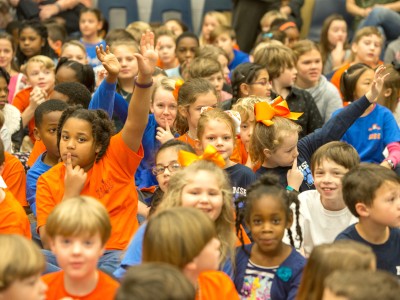 Madison Station students hands up