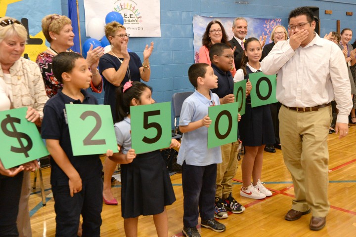 Manny Zaldivar walks to front with students