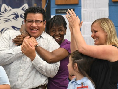 Manny Zaldivar with happy colleagues