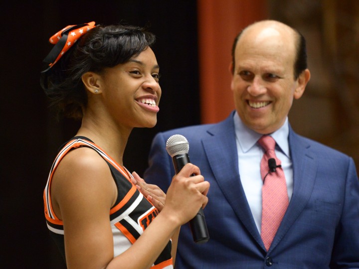 Mark Miazga Mike Milken with cheerleader volunteer