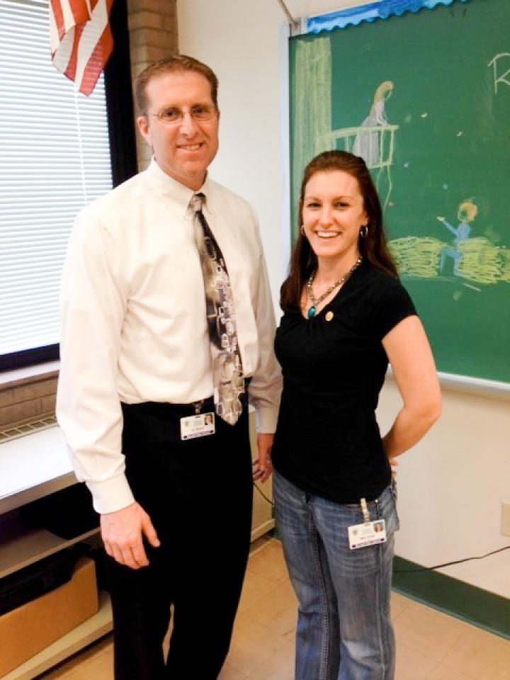 Meghan Nese pinning with principal Dr Boylan