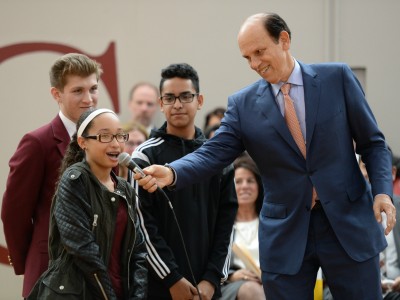 Michael Milken introduces kids to assembly