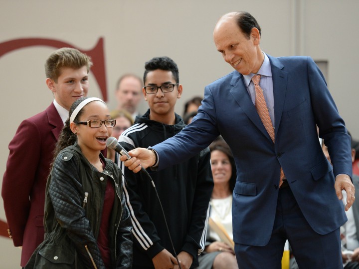 Michael Milken introduces kids to assembly