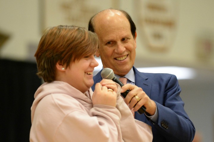 Mike Milken calls up students