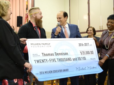 Mike Milken congratulates Thomas Dennison