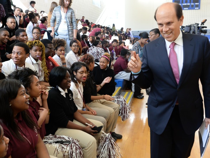 Mike Milken warms up the crowd