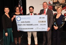 NC Page Justin Scarbro check