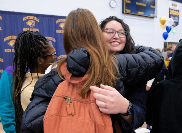 NHS Reina Cruz students hug