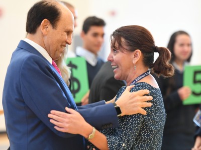 Newark Charter 2017 Mike Milken congratulates Tami Lunsford