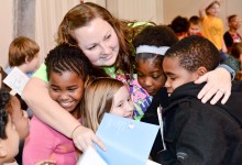 Nicole Castile hugs students