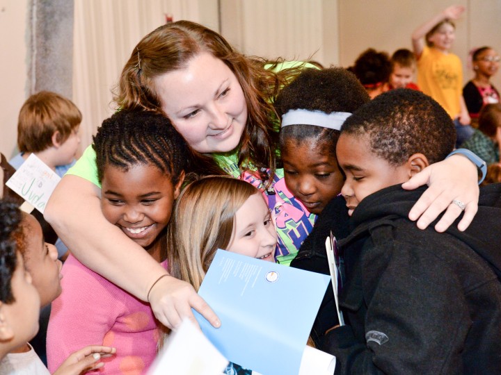 Nicole Castile hugs students