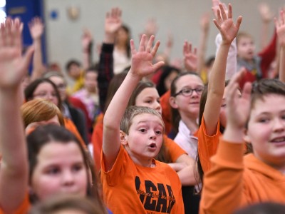 Oak Hill students hands up