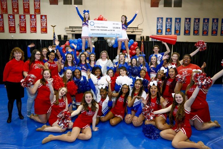 Pass Christian 2017 cheerleaders celebrate Robyn Killebrew