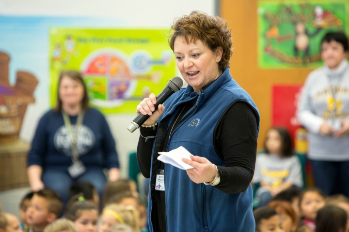 Principal Betsy Kinkade opens assembly