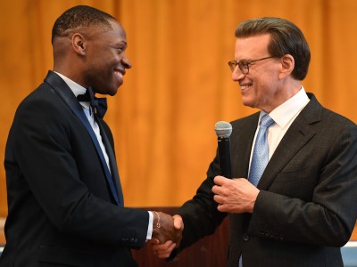 QLA Marco French Lowell Milken handshake