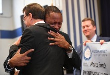QLA Marco French Lowell Milken hug