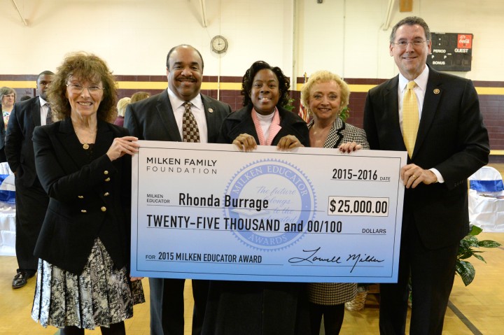 Rhonda Burrage check with dignitaries