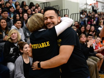 Ricardo Larios hug from principal
