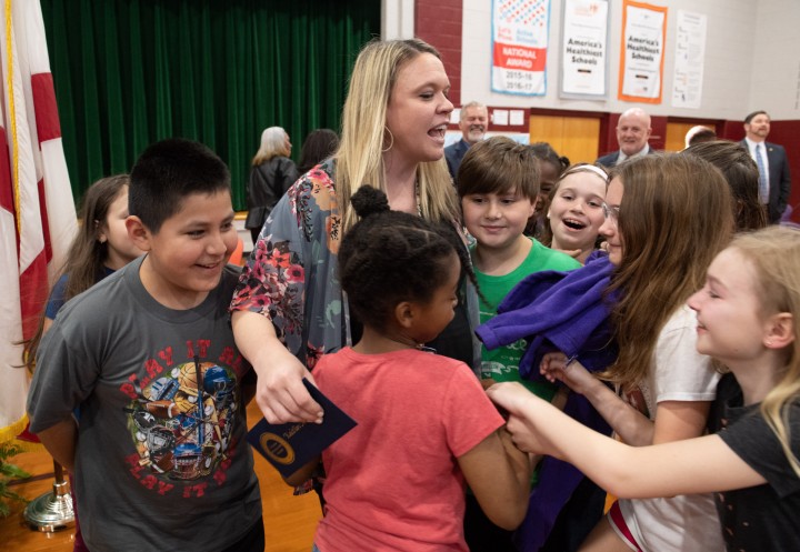 Rocky Ridge Kaitlin McPeake students hug