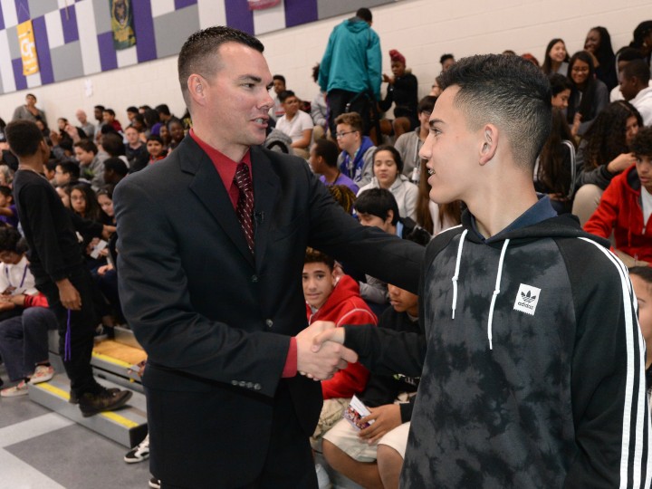 Rogers Ranch student congratulates Timothy Thomas