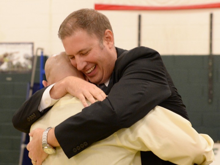 Ryan Moore bear hug principal Brian Dilka