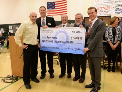 Ryan Moore with 25K check